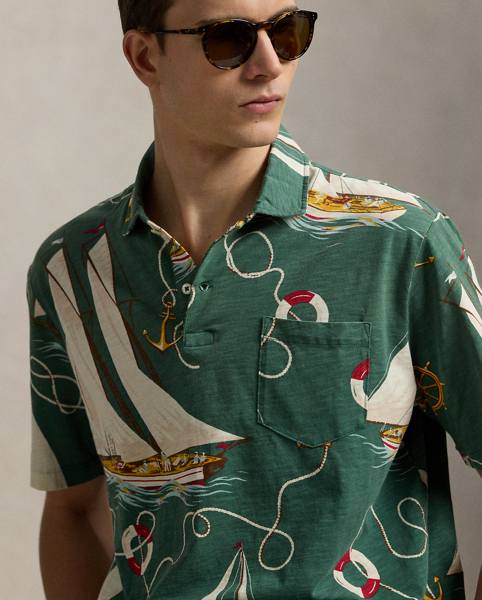 An American style standard since 1972, the Polo shirt has been imitated but never matched. Over the decades, Ralph Lauren Lauren has re-imagined his signature style in a wide array of colours and fits, yet all retain the quality and attention to detail of the iconic original. In gauzy cotton jersey, this version features an archival Ralph Lauren Lauren print from the early noughties: a sailboat motif inspired by mid-20th-century home furnishing patterns.