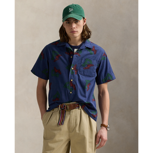 This lightweight cotton chino shirt features our iconic P-Wing logo, which was first introduced in 1992 and is inspired by vintage track-and-field iconography.