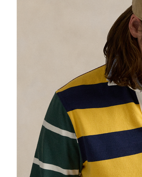 Designed with all the hallmarks of a traditional rugby shirt, this version features a pieced construction comprising bold stripes and solid-hued panels. It is intricately embroidered with our logo and a vintage collegiate-inspired emblem.
