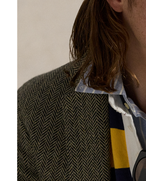 Designed with all the hallmarks of a traditional rugby shirt, this version features a pieced construction comprising bold stripes and solid-hued panels. It is intricately embroidered with our logo and a vintage collegiate-inspired emblem.