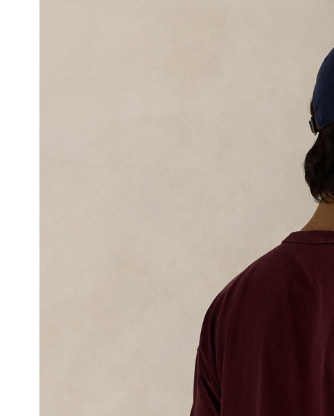 This cotton T-shirt features an athletic-inspired emblem at the front and is garment-dyed for tonal variation.