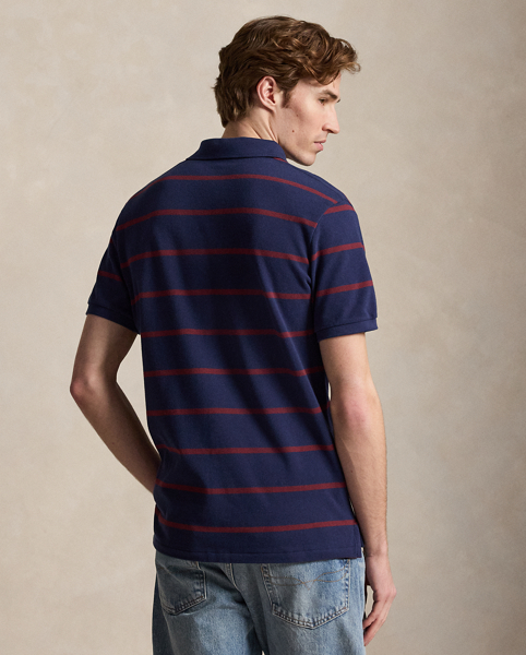 An American style standard since 1972, the Polo shirt has been imitated but never matched. Over the decades, Ralph Lauren Lauren has reimagined his signature style in a wide array of colours and fits, yet all retain the quality and attention to detail of the iconic original. This striped version features our beloved Collegiate Bear with a few stylish updates – tortoiseshell glasses and a Polo-emblazoned pullover.