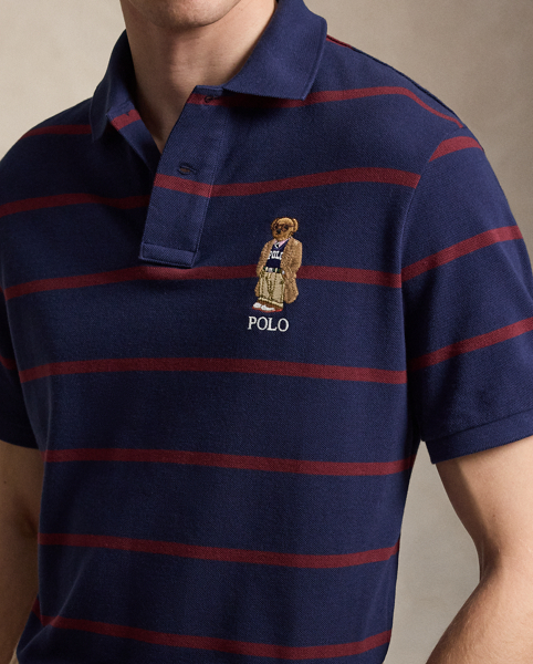 An American style standard since 1972, the Polo shirt has been imitated but never matched. Over the decades, Ralph Lauren Lauren has reimagined his signature style in a wide array of colours and fits, yet all retain the quality and attention to detail of the iconic original. This striped version features our beloved Collegiate Bear with a few stylish updates – tortoiseshell glasses and a Polo-emblazoned pullover.