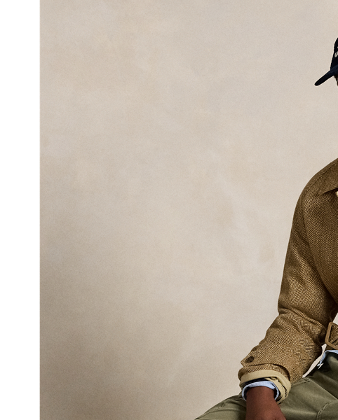 These cotton twill trousers combine a classic utilitarian silhouette with our iconic Big Fit from the '90s. They are crafted with authentic vintage details, including interior and exterior buttons for braces, side adjusters, and darted pleating at the knees.