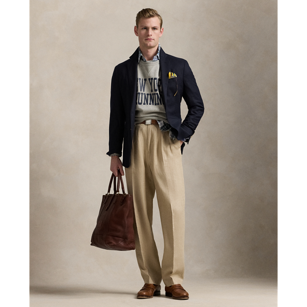 The Whitman offers a classic Polo look courtesy of its relaxed, pleated silhouette. This linen-blend version is crafted from a haberdashery-quality herringbone fabric, which was custom-developed for  Ralph Lauren Lauren.