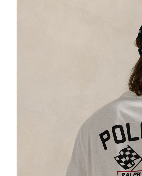 Part of the season's motorsport-inspired collection, this cotton T-shirt is printed with bold signature graphics and checkered racing flags.