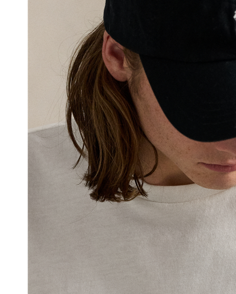 Part of the season's motorsport-inspired collection, this cotton T-shirt is printed with bold signature graphics and checkered racing flags.