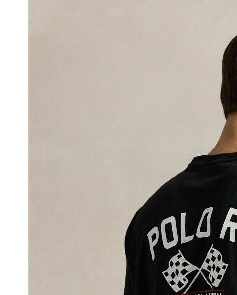 Part of the season's motorsport-inspired collection, this cotton T-shirt is printed with bold signature graphics and checkered racing flags.