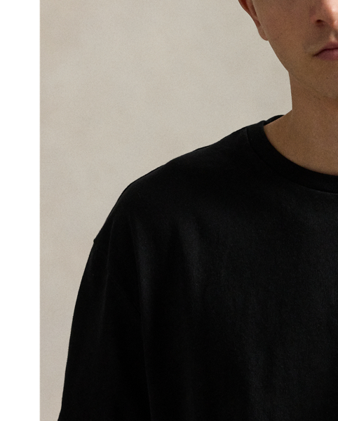 Part of the season's motorsport-inspired collection, this cotton T-shirt is printed with bold signature graphics and checkered racing flags.