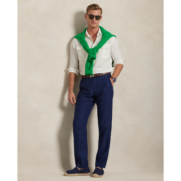 In our signature Straight Fit, these trousers feature a classic miniature houndstooth pattern rendered in a lightweight blend of linen and cotton.