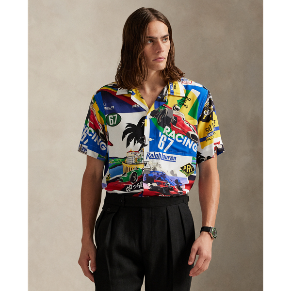 This camp shirt is printed with a collage of custom artwork that's based on vintage motorsport posters and the patches used in the season's racing-inspired collection.