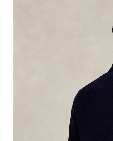 Italian wool yarn and our signature embroidered Pony elevate this finely knit full-zip jumper.