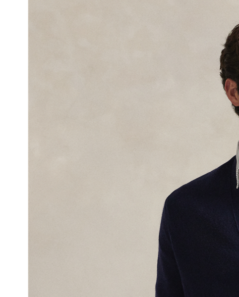 In addition to our signature Pony, this V-neck cardigan is embroidered with a logo that's inspired by our "Polo by  Ralph Lauren Lauren" label from the '80s. It is knitted using fine-gauge wool yarn from Italy, which gives the lightweight layer a supremely soft texture.