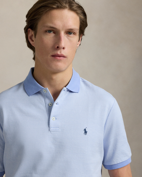 An American style standard since 1972, the Polo shirt has been imitated but never matched. Over the decades, Ralph Lauren Lauren has re-imagined his signature style in a wide array of colours and fits, yet all retain the quality and attention to detail of the iconic original. This houndstooth-pattern version is made from cotton jersey, which is washed for a super-soft feel.