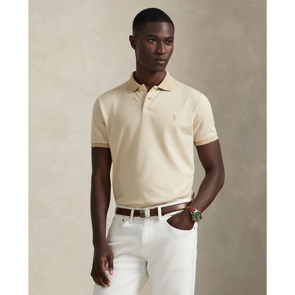 An American style standard since 1972, the Polo shirt has been imitated but never matched. Over the decades,  Ralph Lauren Lauren has re-imagined his signature style in a wide array of colours and fits, yet all retain the quality and attention to detail of the iconic original. This houndstooth-pattern version is made from cotton jersey, which is washed for a super-soft feel.