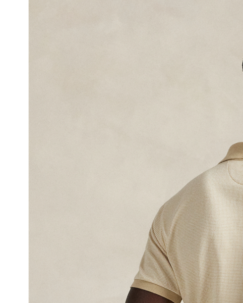 An American style standard since 1972, the Polo shirt has been imitated but never matched. Over the decades,  Ralph Lauren Lauren has re-imagined his signature style in a wide array of colours and fits, yet all retain the quality and attention to detail of the iconic original. This houndstooth-pattern version is made from cotton jersey, which is washed for a super-soft feel.