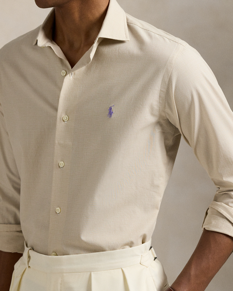 This shirt's poplin fabric combines soft, breathable cotton with extra stretch for added comfort. At the left chest, it is intricately embroidered with our signature Pony for an iconic finish.