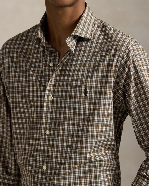 This shirt's poplin fabric combines soft, breathable cotton with extra stretch for added comfort. At the left chest, it is intricately embroidered with our signature Pony for an iconic finish.