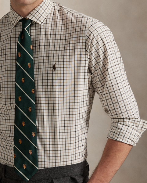 This shirt's poplin fabric combines soft, breathable cotton with extra stretch for added comfort. At the left chest, it is intricately embroidered with our signature Pony for an iconic finish.