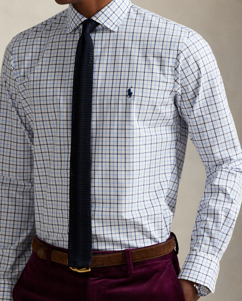 This shirt's poplin fabric combines soft, breathable cotton with extra stretch for added comfort. At the left chest, it is intricately embroidered with our signature Pony for an iconic finish.