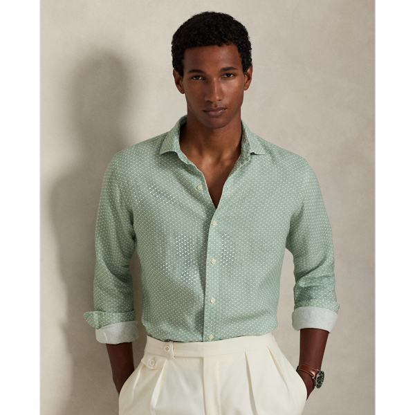 Lightweight, breathable linen makes this shirt perfectly suited to warm-weather days, while a miniature motif of riding helmets and crops adds equestrian-inspired style.