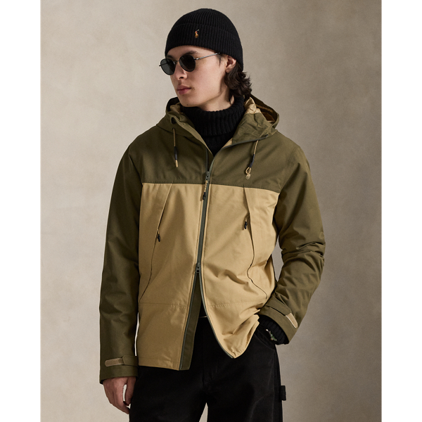 This colour-blocked jacket shields you from the rain thanks to its lightweight, water-resistant fabric and drawstring hood.