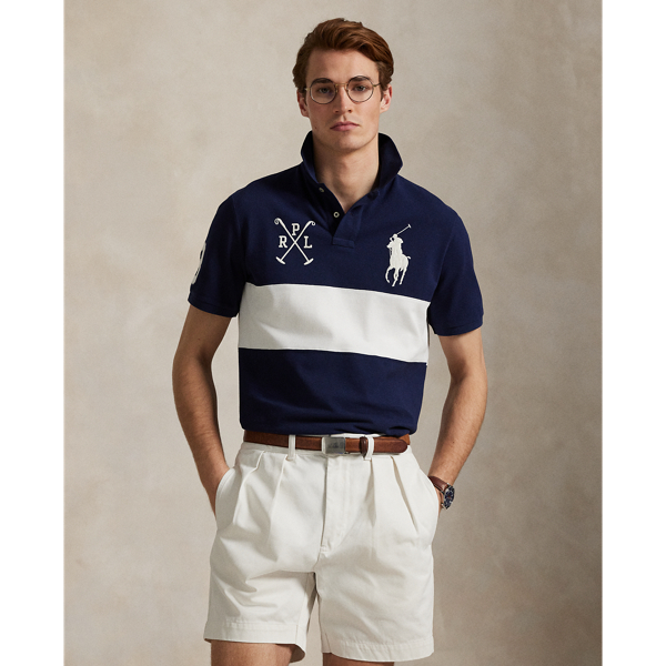 An American style standard since 1972, the Polo shirt has been imitated but never matched. Over the decades, Ralph Lauren Lauren has re-imagined his signature style in a wide array of colours and fits, yet all retain the quality and attention to detail of the iconic original. This version is made from our highly breathable cotton mesh and features a twill “3” patch, which is the number typically worn by a polo team’s strongest player.