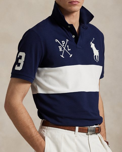 An American style standard since 1972, the Polo shirt has been imitated but never matched. Over the decades, Ralph Lauren Lauren has re-imagined his signature style in a wide array of colours and fits, yet all retain the quality and attention to detail of the iconic original. This version is made from our highly breathable cotton mesh and features a twill “3” patch, which is the number typically worn by a polo team’s strongest player.