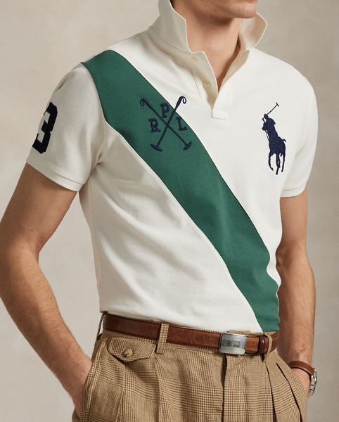 An American style standard since 1972, the Polo shirt has been imitated but never matched. Over the decades, Ralph Lauren Lauren has re-imagined his signature style in a wide array of colours and fits, yet all retain the quality and attention to detail of the iconic original. This version is made from our highly breathable cotton mesh and features a twill “3” patch, which is the number typically worn by a polo team’s strongest player.