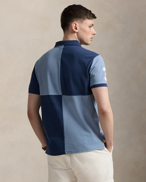 An American style standard since 1972, the Polo shirt has been imitated but never matched. Over the decades, Ralph Lauren Lauren has re-imagined his signature style in a wide array of colours and fits, yet all retain the quality and attention to detail of the iconic original. This version is made from our highly breathable cotton mesh and features a twill “3” patch, which is the number typically worn by a polo team’s strongest player.