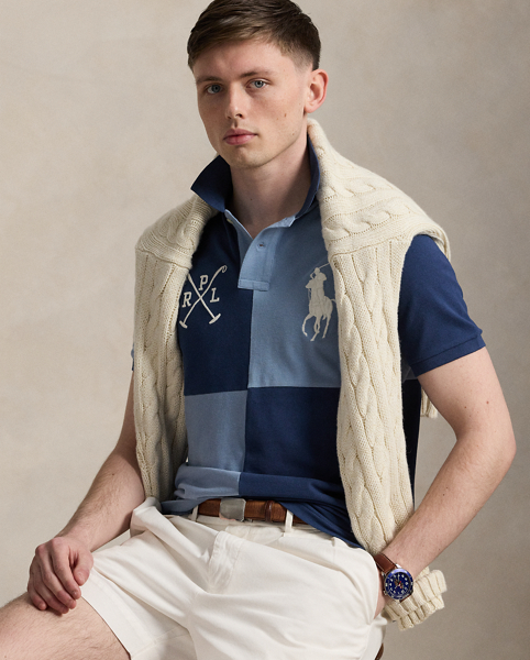 An American style standard since 1972, the Polo shirt has been imitated but never matched. Over the decades, Ralph Lauren Lauren has re-imagined his signature style in a wide array of colours and fits, yet all retain the quality and attention to detail of the iconic original. This version is made from our highly breathable cotton mesh and features a twill “3” patch, which is the number typically worn by a polo team’s strongest player.