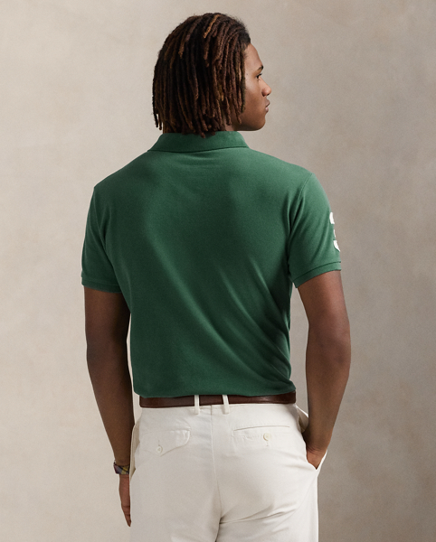 An American style standard since 1972, the Polo shirt has been imitated but never matched. Over the decades, Ralph Lauren Lauren has re-imagined his signature style in a wide array of colours and fits, yet all retain the quality and attention to detail of the iconic original. This version is made from our highly breathable cotton mesh and features a twill “3” patch, which is the number typically worn by a polo team’s strongest player.