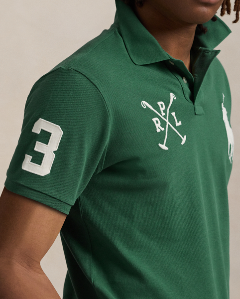 An American style standard since 1972, the Polo shirt has been imitated but never matched. Over the decades, Ralph Lauren Lauren has re-imagined his signature style in a wide array of colours and fits, yet all retain the quality and attention to detail of the iconic original. This version is made from our highly breathable cotton mesh and features a twill “3” patch, which is the number typically worn by a polo team’s strongest player.