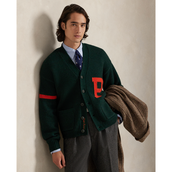 Part of the season's regatta-inspired collection, this cardigan is expertly knit with thick-gauge wool yarn from the United Kingdom and has an intarsia-knit "P" graphic on the chest.