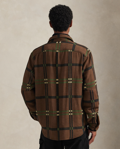 Inspired by the vintage overshirts donned by woodsmen, this shirt contrasts a utilitarian silhouette and reinforced elbow patches with soft cotton flannel. A geometric jacquard design and corozo buttons add refined Polo style.