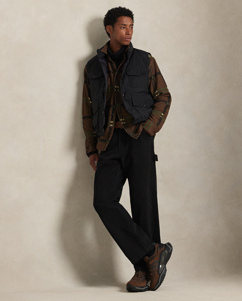 Inspired by the vintage overshirts donned by woodsmen, this shirt contrasts a utilitarian silhouette and reinforced elbow patches with soft cotton flannel. A geometric jacquard design and corozo buttons add refined Polo style.