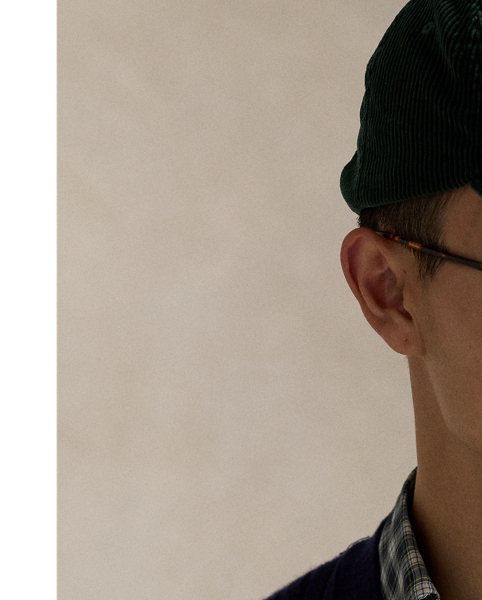 Developed in our iconic Big Fit from the '90s. this V-neck cardigan features a dog graphic and our Polo logo embroidered at the chest.