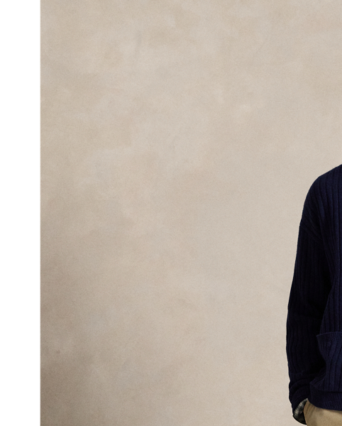 Developed in our iconic Big Fit from the '90s. this V-neck cardigan features a dog graphic and our Polo logo embroidered at the chest.