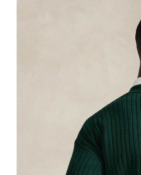 Developed in our iconic Big Fit from the '90s. this V-neck cardigan features a dog graphic and our Polo logo embroidered at the chest.