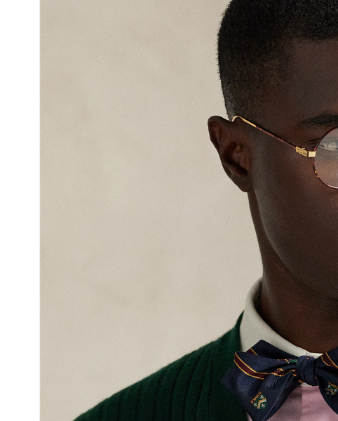 Developed in our iconic Big Fit from the '90s. this V-neck cardigan features a dog graphic and our Polo logo embroidered at the chest.