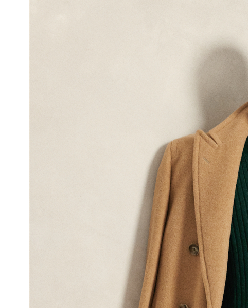 Developed in our iconic Big Fit from the '90s. this V-neck cardigan features a dog graphic and our Polo logo embroidered at the chest.