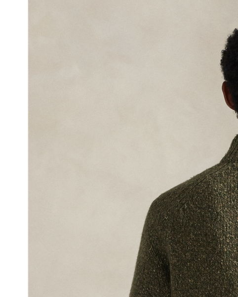 This chunky-knit cardigan is made from wool-blend yarn and finished with custom-developed buttons for signature Polo style.