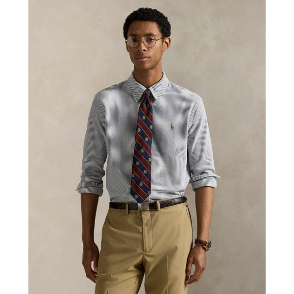 Inspired by two of our icons, this striped button-down combines the look of an oxford with the comfort and ease of our Polo shirt's cotton mesh fabric.