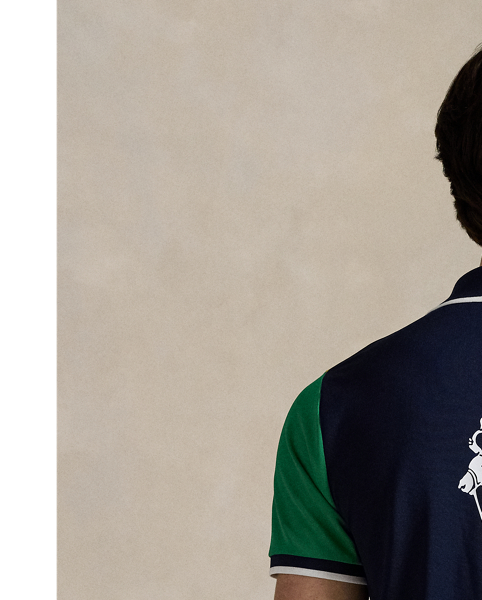 Celebrating  Ralph Lauren Lauren's 20th anniversary in partnership with the US Open, this Polo shirt is part of our 2025 US Open Tennis Championships collection. It is inspired by the ball crew uniform  Ralph Lauren Lauren designed for this year's tournament and is crafted from moisture-wicking stretch mesh. In addition to the sporting event's official logo, it features two iterations of our iconic Big Pony.