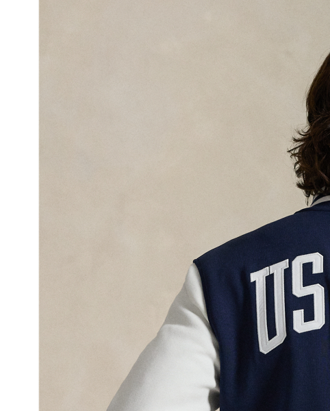 Celebrating  Ralph Lauren Lauren's 20th anniversary in partnership with the US Open, this baseball jacket is part of our 2025 US Open Tennis Championships collection. It is crafted from a double-knit fabric with mesh backing and features bold graphics, including a commemorative crest.