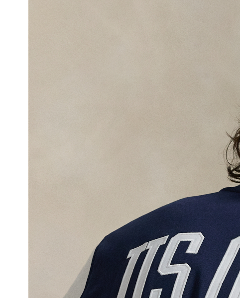 Celebrating  Ralph Lauren Lauren's 20th anniversary in partnership with the US Open, this baseball jacket is part of our 2025 US Open Tennis Championships collection. It is crafted from a double-knit fabric with mesh backing and features bold graphics, including a commemorative crest.