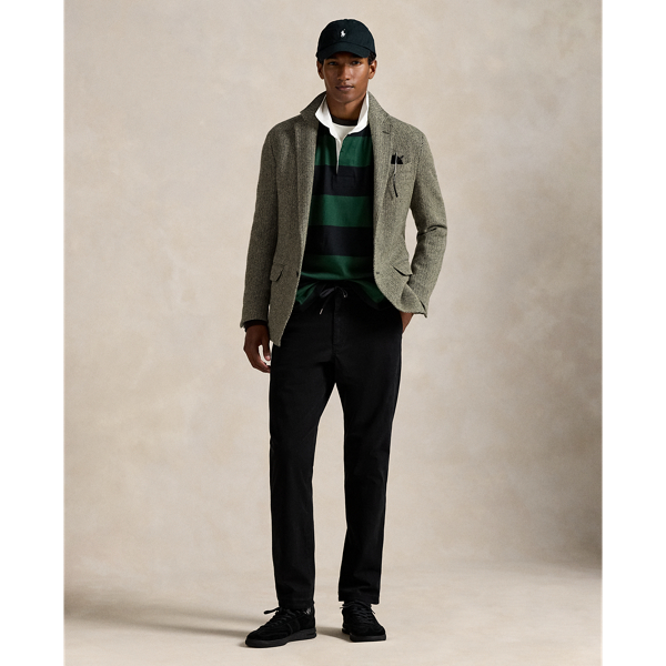 These stretch twill trousers feature a unique convertible construction, which allows the drawstring on the waist to be worn either on the inside or the outside. A garment dye treatment provides tonal variation, while our iconic embroidered Pony gives them a signature Polo finish.