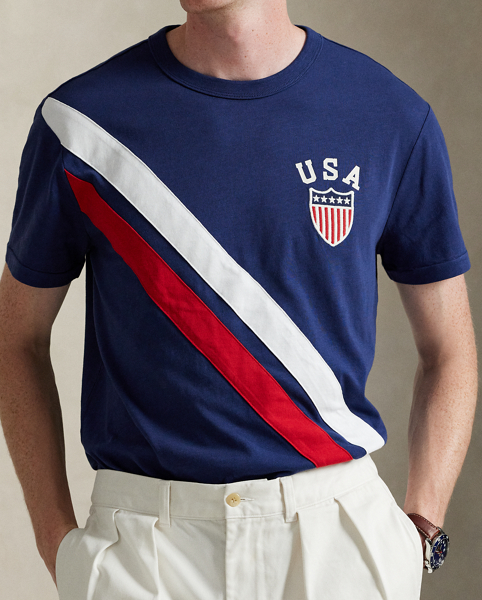 Part of the season's regatta-inspired collection, this slub cotton T-shirt features a shield patch and pieced sash stripes at the front. It is specially washed for a slightly sun-faded appearance, as though you've already worn it out on the water.