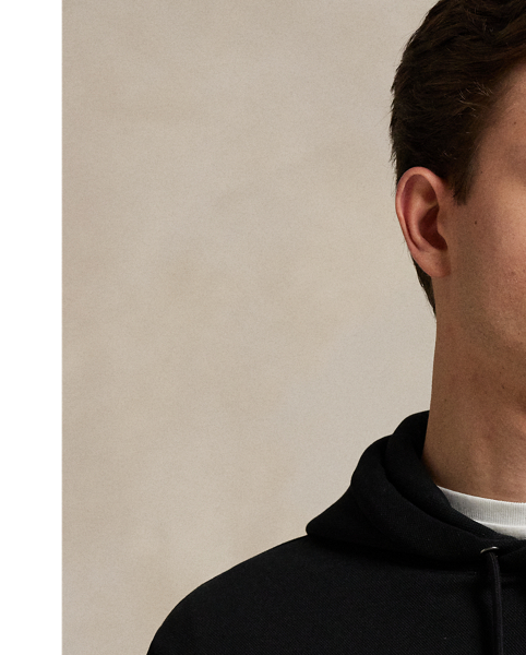 This cotton-blend hoodie is crafted from a smooth double-knit fabric that features a mesh underside. At the left chest, it is intricately embroidered with the iconic Polo Pony for a signature finish.