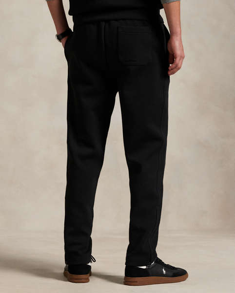 These lightweight track trousers are crafted from a smooth double-knit fabric that features a mesh underside. Tonal stripes and zipped vented hems further their sporty appeal.